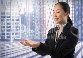 Businesswoman with hands palm open in city office