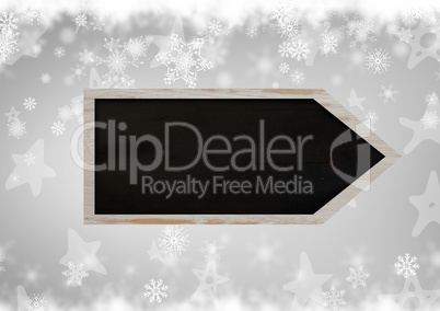 Blackboard arrow sign on Christmas theme background with snowflakes