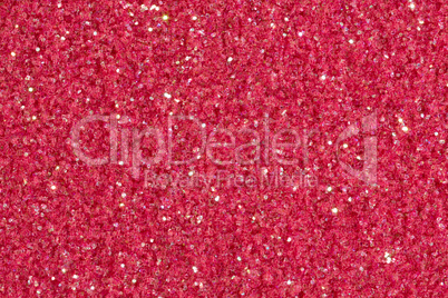Pink background with glitter with light.