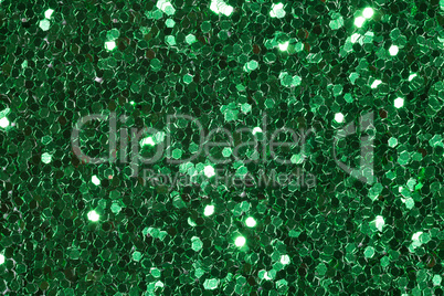 Green background with contrast and glitter.