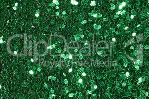 Green background with contrast and glitter.