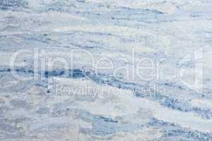 Blue marble patterned texture background.
