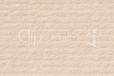 Beige kraft paper texture, macro shot.