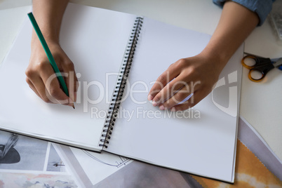 Fashion designer working at desk