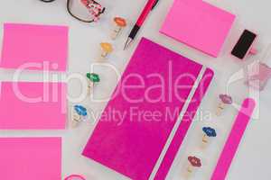 Pink hued accessories,candy sticks and stationery items