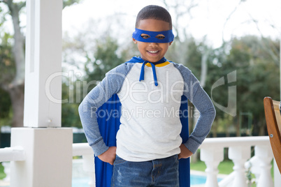 Boy pretending to be a superhero