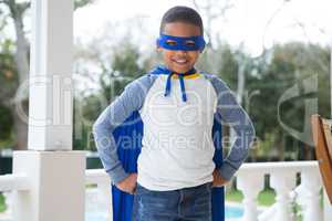 Boy pretending to be a superhero