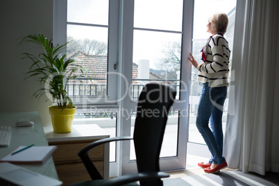 Woman standing at home