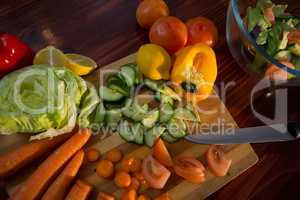 Overhead of fresh vegetables on chopping board