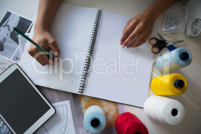 Fashion designer working at desk