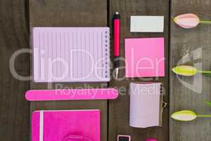 Overhead of female accessories and stationery