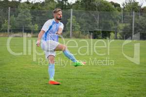 Soccer player playing football