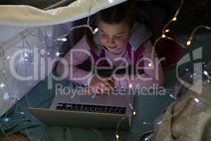 Cute girl using laptop
