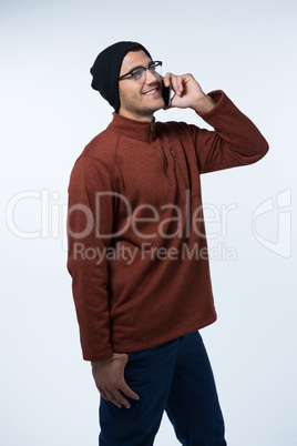 Man in winter cloth talking on mobile phone