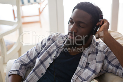 Man sleeping while listening to music