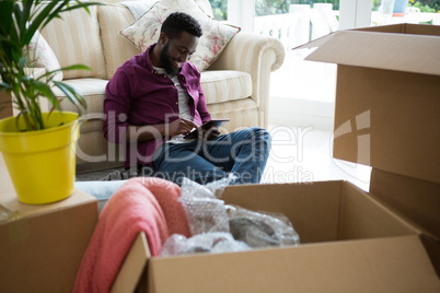 Man using digital tablet