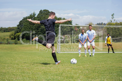 Football player taking a penalty shot