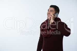 Man in winter cloth talking on mobile phone