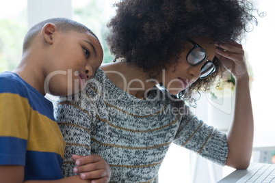 Mother with his son relaxing at home