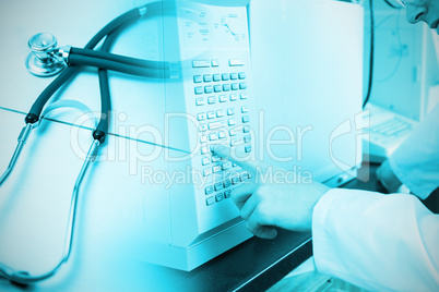 Composite image of science student using a laboratory chamber furnace in a laboratory