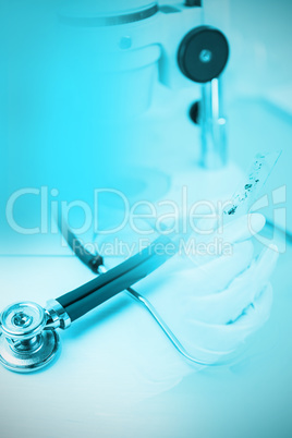 Composite image of stethoscope on desk Composite image of stethoscope on desk