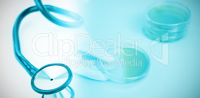 Composite image of blue stethoscope