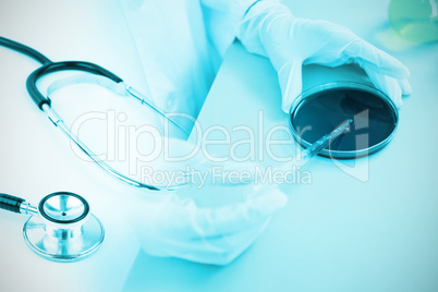 Composite image of metal black stethoscope