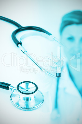 Composite image of metal black stethoscope