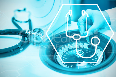 Composite image of digital background with stethoscope sign