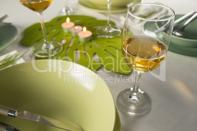 Glasses of wine with table setting
