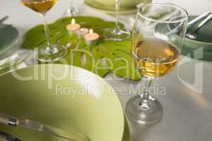 Glasses of wine with table setting