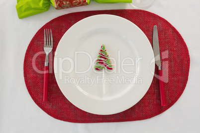 Plate and cutlery set beautifully on Christmas theme