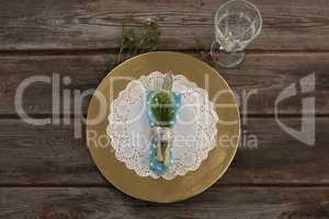 Elegance table setting on wooden plank