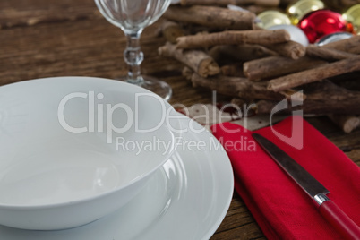 Butter knife, napkin with plate and christmas decoration