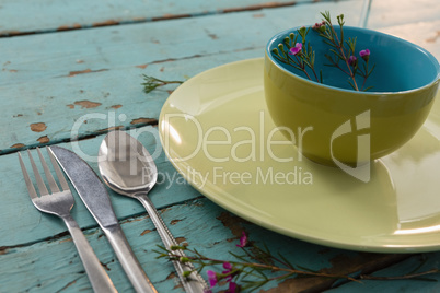 Crockeries and kitchen ware on weathered table