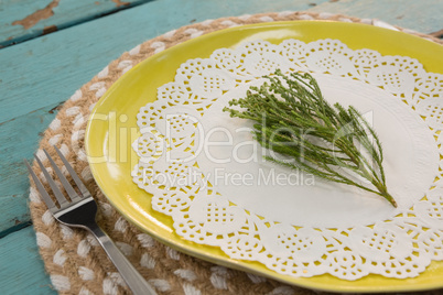Table setting on wooden plank