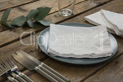 Plate with cutlery set and napkin