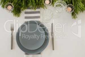 Plate and cutlery set elegantly on a table