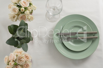 Plate and cutlery set elegantly on a table