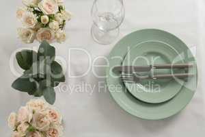 Plate and cutlery set elegantly on a table