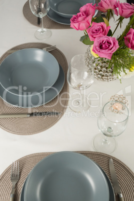 Plate and cutlery set elegantly on a table