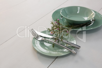 Elegance table setting on wooden plank