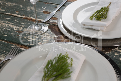 Table setting on weathered wooden plank