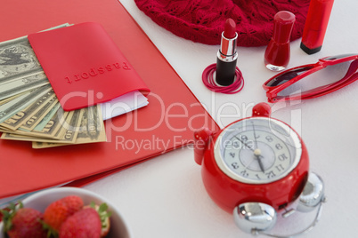 Female accessories, fruits and currency on white background