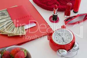 Female accessories, fruits and currency on white background