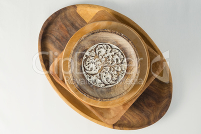 Wooden plates set on dinning table