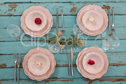 Elegance table setting on weathered wooden plank