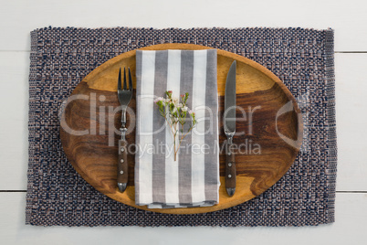 Elegance table setting on wooden plank