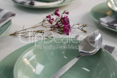 Elegance table setting on wooden plank