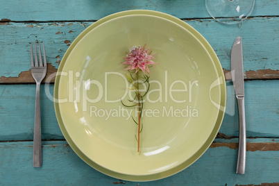 Table setting on weathered wooden plank